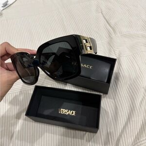 Versace Elegant Black Sunglasses with Gold Accent